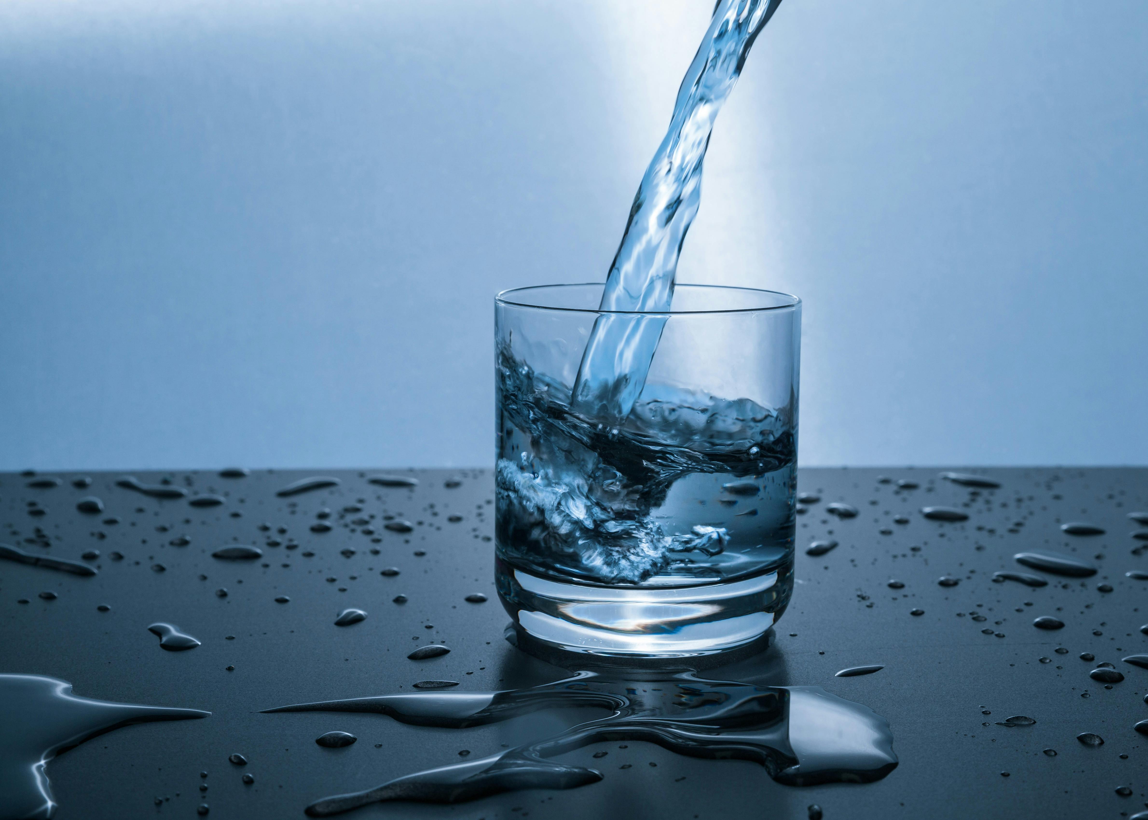 water pouring in glass for hydration